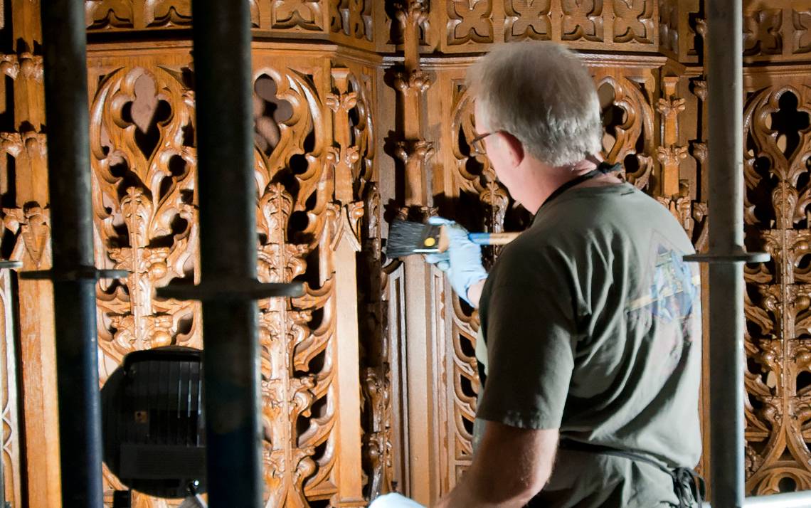 Restoration work is done to the wood carvings in Duke University Chapel.