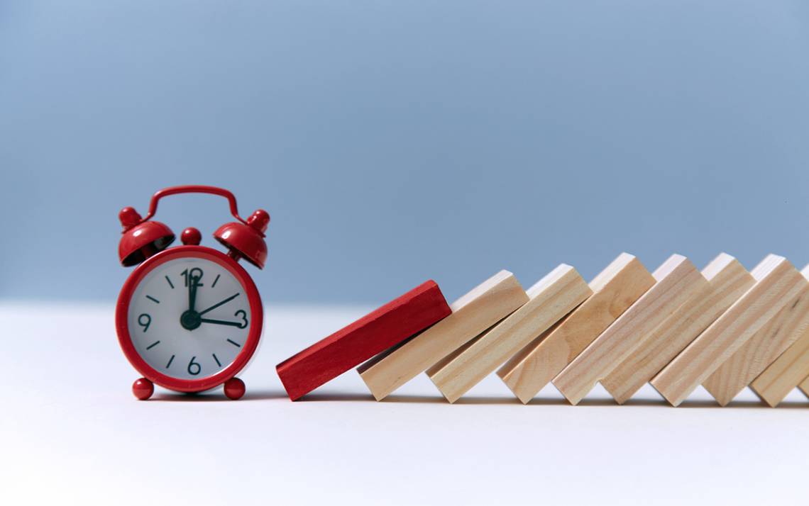 A clock with some dominoes.