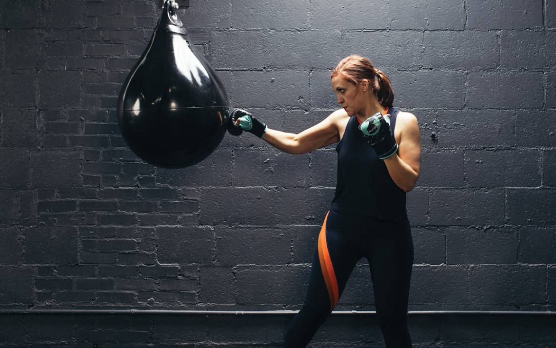 Rachel Meyer boxes at MADabolic gym in Raleigh earlier this year. Photo by Alex Boerner.