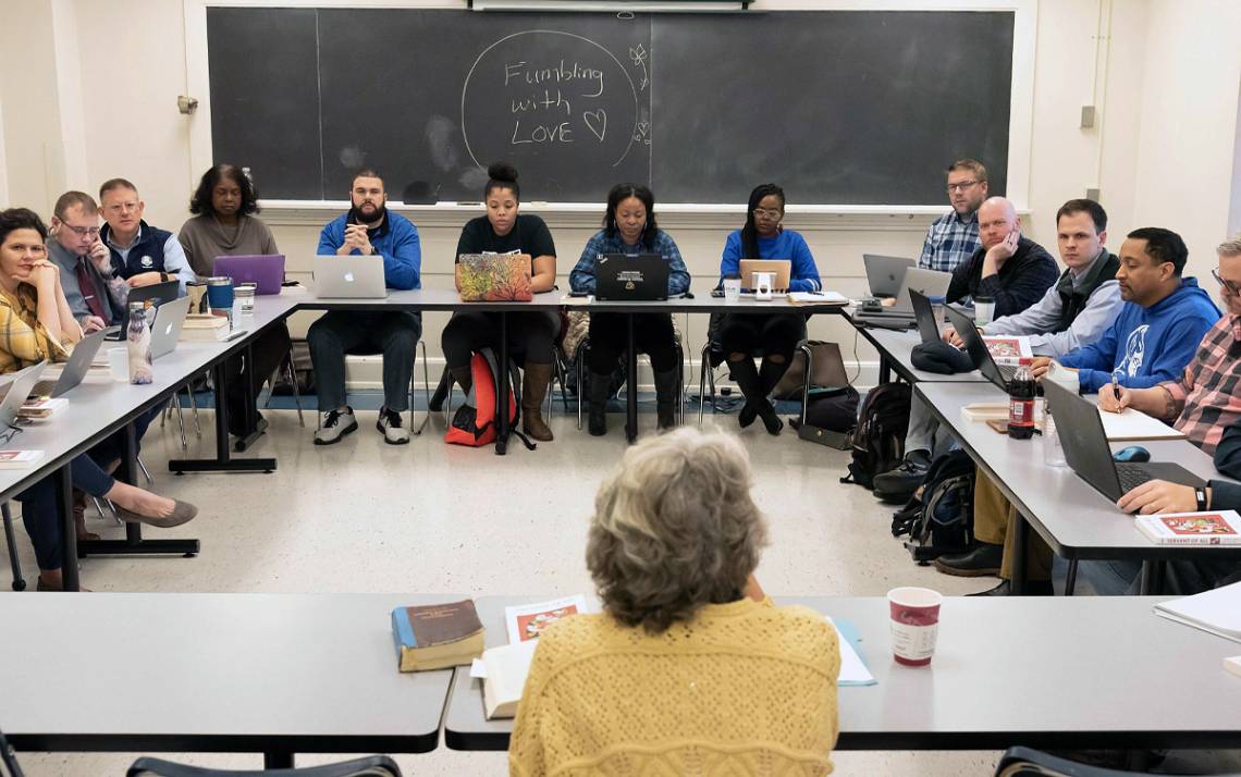 Duke employee Daniel Corpening, on the right side of the classroom in the blue shirt and vest, attends a class as part of the Duke Divinity School's Doctor of Ministry program. Photo courtesy of Duke Divinity School.