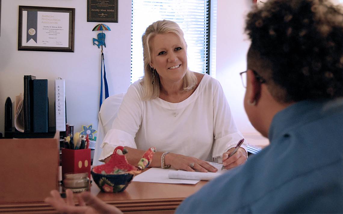 Dot Mishoe at her desk.