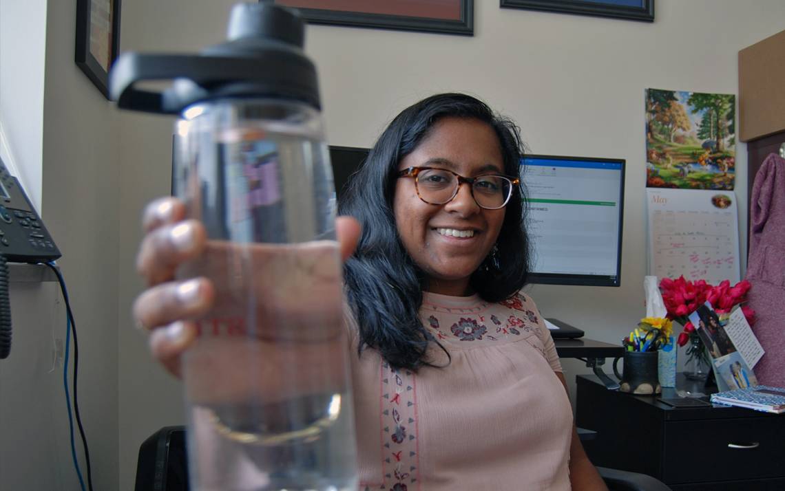 Minoka Gunesekera of the Duke Divinity School shows off her water bottle. Photo by Stephen Schramm.