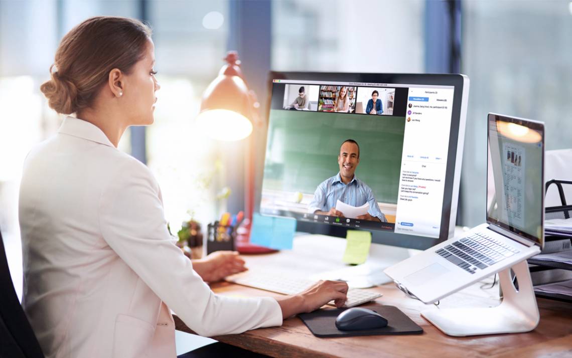 Having good posture, expressing yourself using facial features and making eye contact can help communications with colleagues during virtual meetings. Photo courtesy of Zoom.