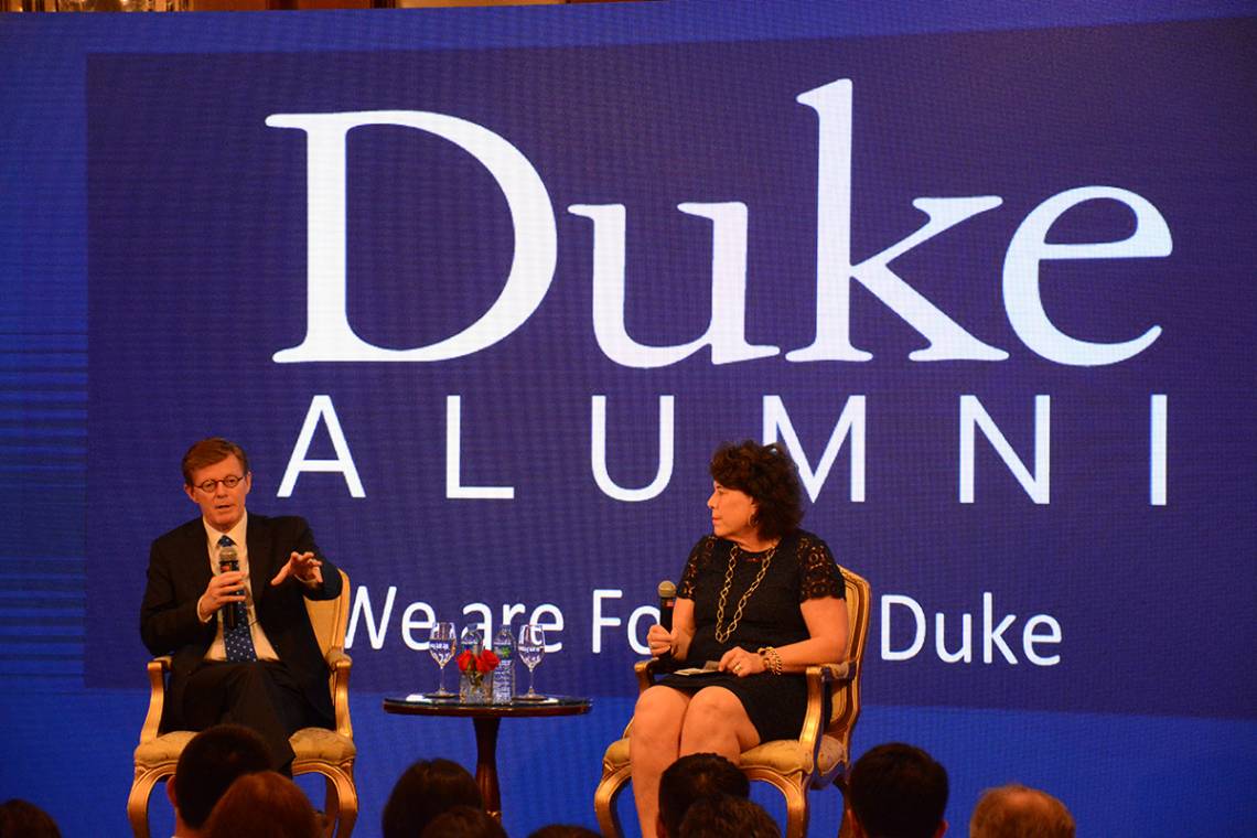 Price and Sterly Wilder meet with alumni in Hong Kong.