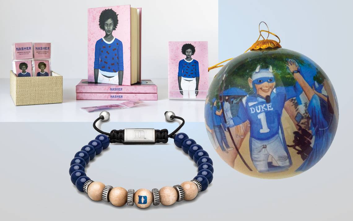 A selection of gifts available from Duke, including books, an hand-painted ornament and a commemorative bracelet.