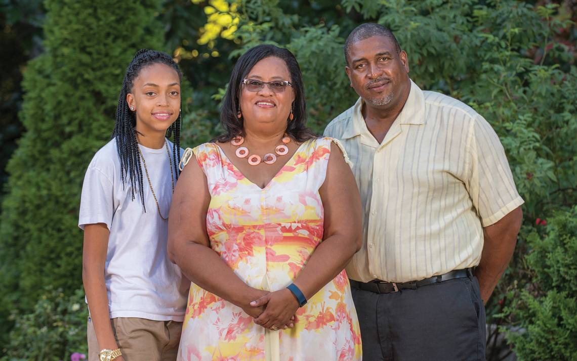 Theresa Johnson, center, visits Sarah P. Duke Gardens with her daughter, Tariah, and her husband, Johnny, who was diagnosed with cancer in 2011.