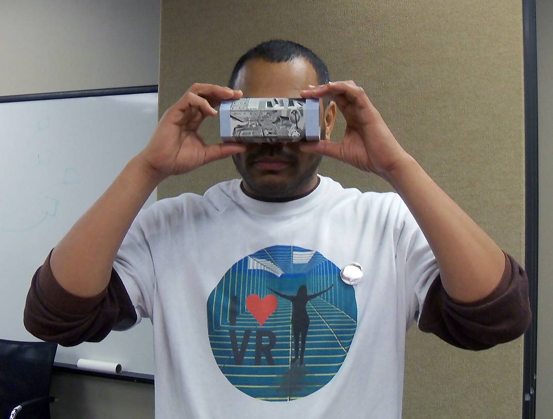 Mark McGill of OIT demonstrates a virtual reality tool at a spring demonstration.