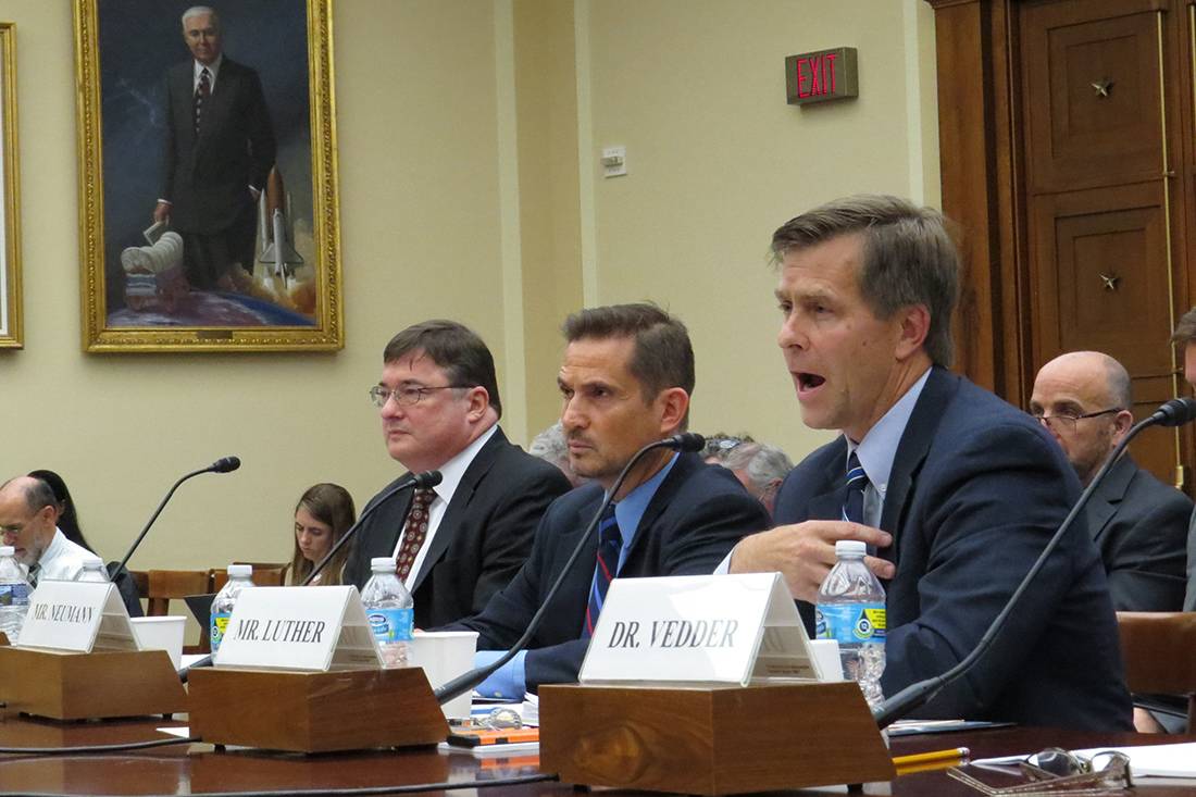 Jim Luther testifies on research costs Wednesday before a congressional subcommittee.