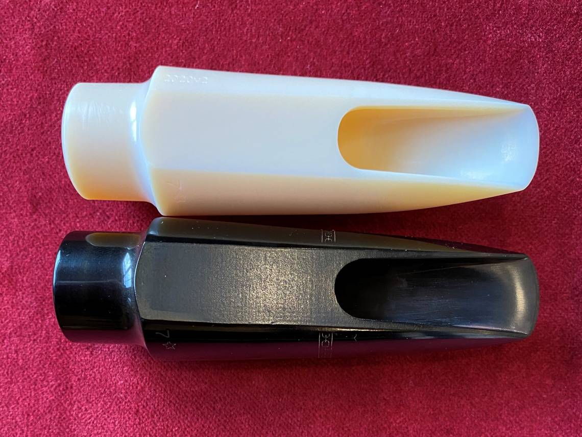 This replica of a vintage saxophone mouthpiece (top) was 3D printed using microCT scans of the original (bottom). Courtesy of Brian Curry.