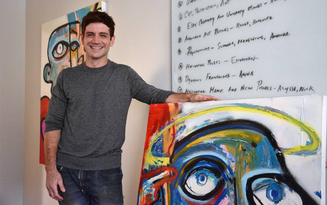Duke Assistant Professor Paul Seli has found an outlet in creating colorful oil paintings. Photo by Stephen Schramm.