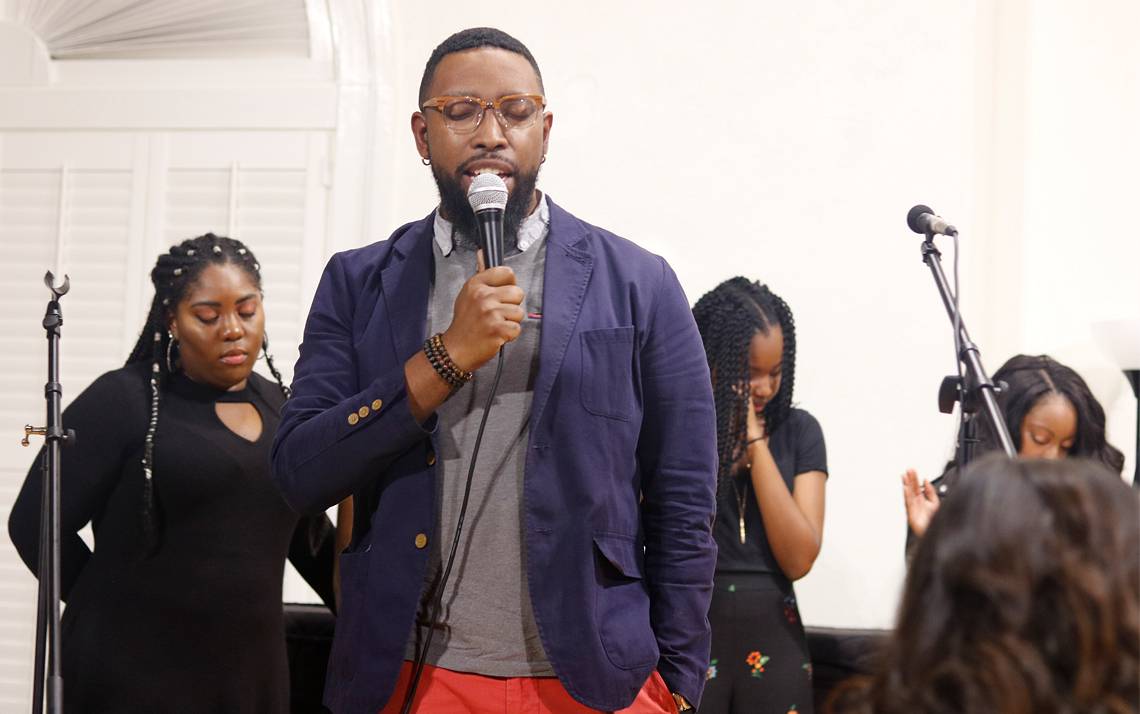 Joshua Lazard performs with the Duke student gospel choir United in Praise, which is he is the adviser for. Photo by Corey Pilson.