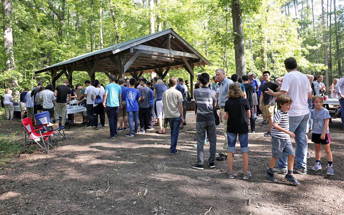 Guests attend the Duke Department of Physics’ annual welcome picnic in Duke Forest. Photo courtesy of the Department of Physics.