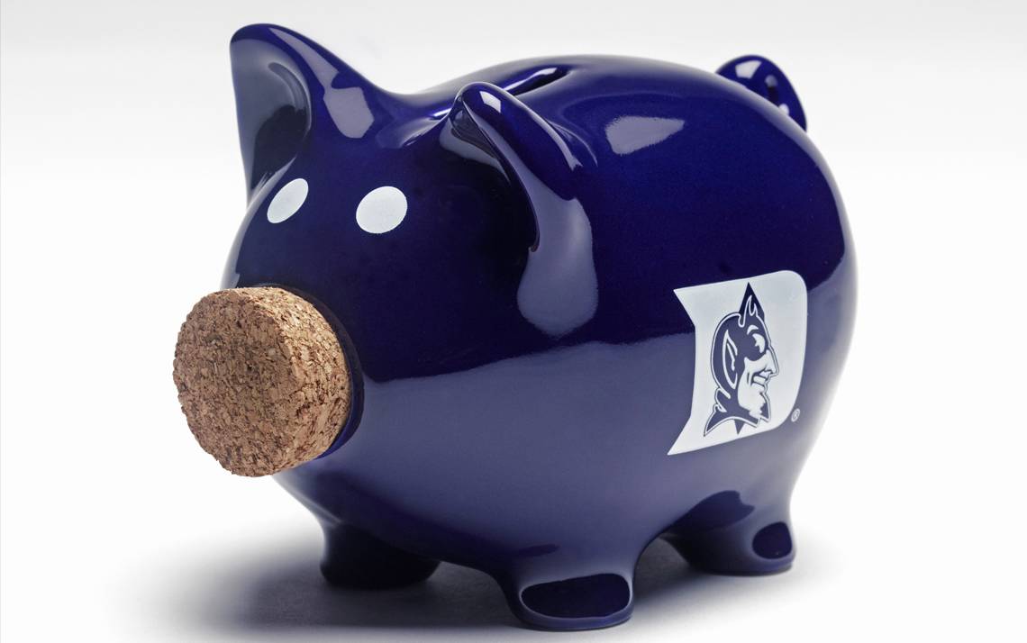 Blue piggy bank with a Duke logo.