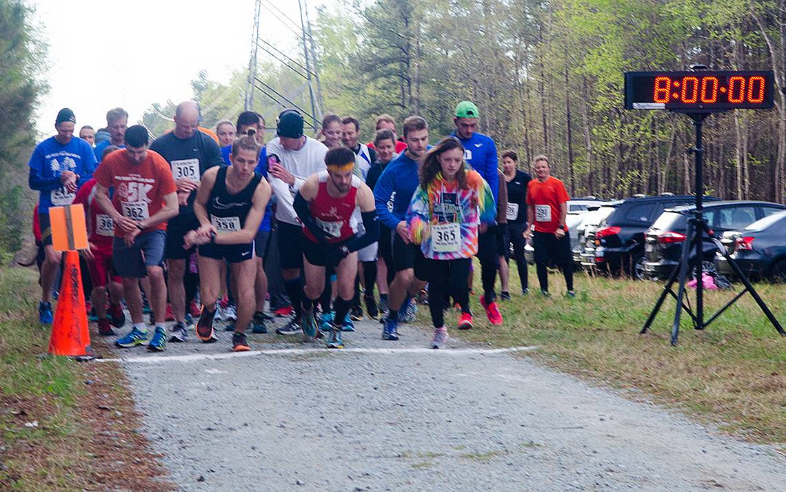 Runners leave the starting line at the Pine Cone Pacer.