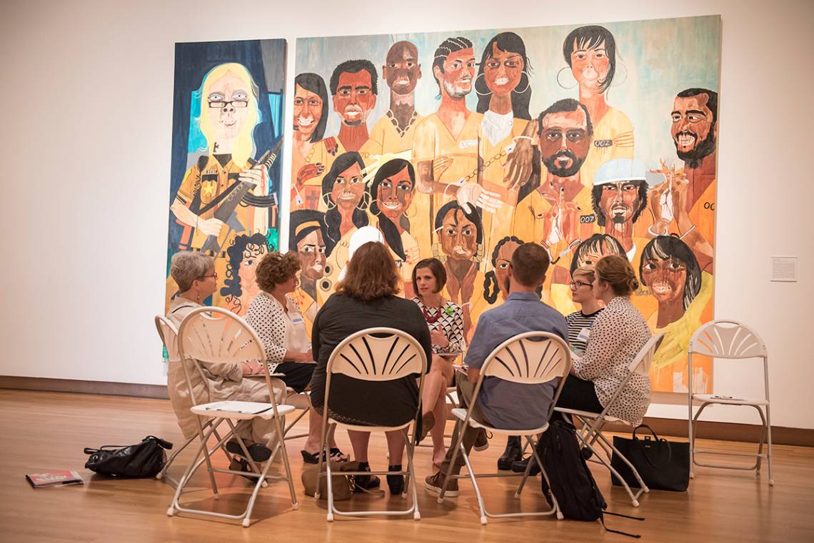 Jessica Ruhle, center, guides a conversation on art at the Nasher Museum as part of the Reflections program. Photo by J Caldwell
