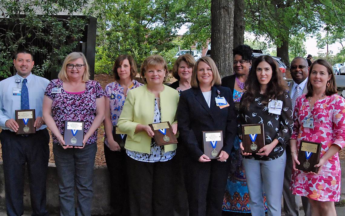 Pictured, from left to right: Brandon Faw, Michelle Shoffner, Missy Harding, Robin Pietrantoni, Dot Taylor, Karen Reavis, Faye Woods, Liset Denis, Curtis Wright, Sarah Haithcock.