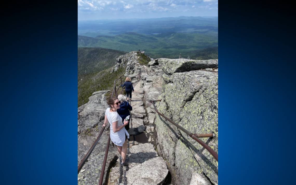 Sarah McGreevy, in the white T-shirt, hikes Whiteface Mountain in New York with her mom and aunt. Photo courtesy of Sarah McGreevy.