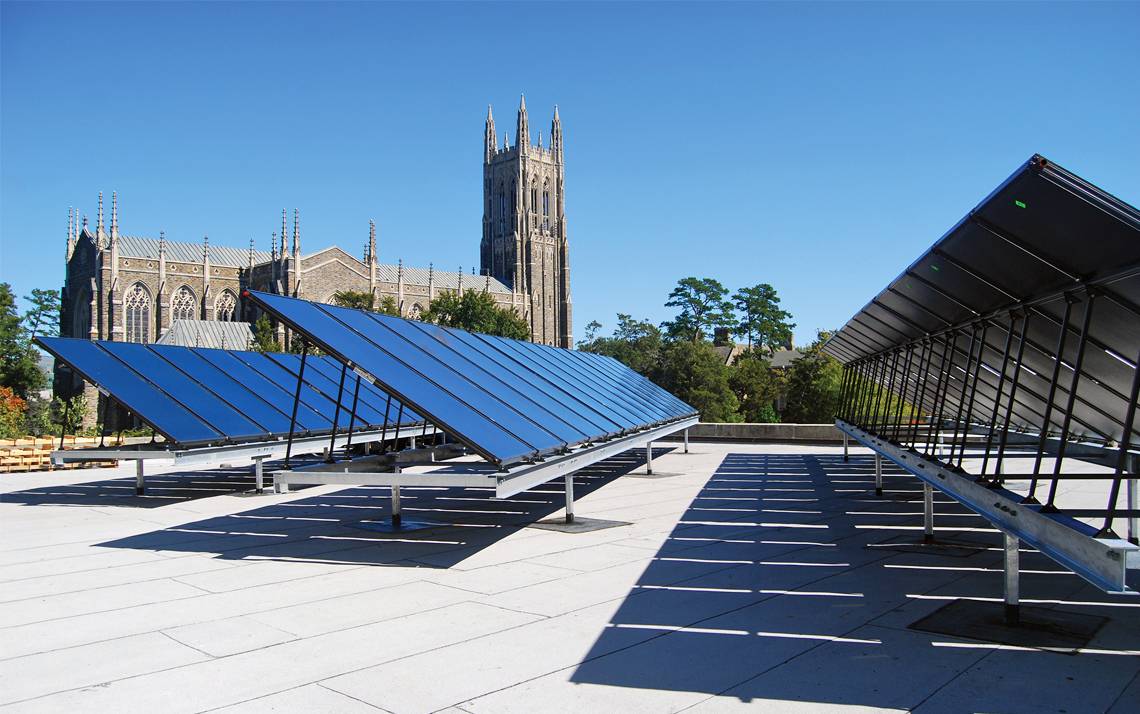 These solar panels on the roof of the Bryan Center are just one way Duke is working to lower its carbon footprint.