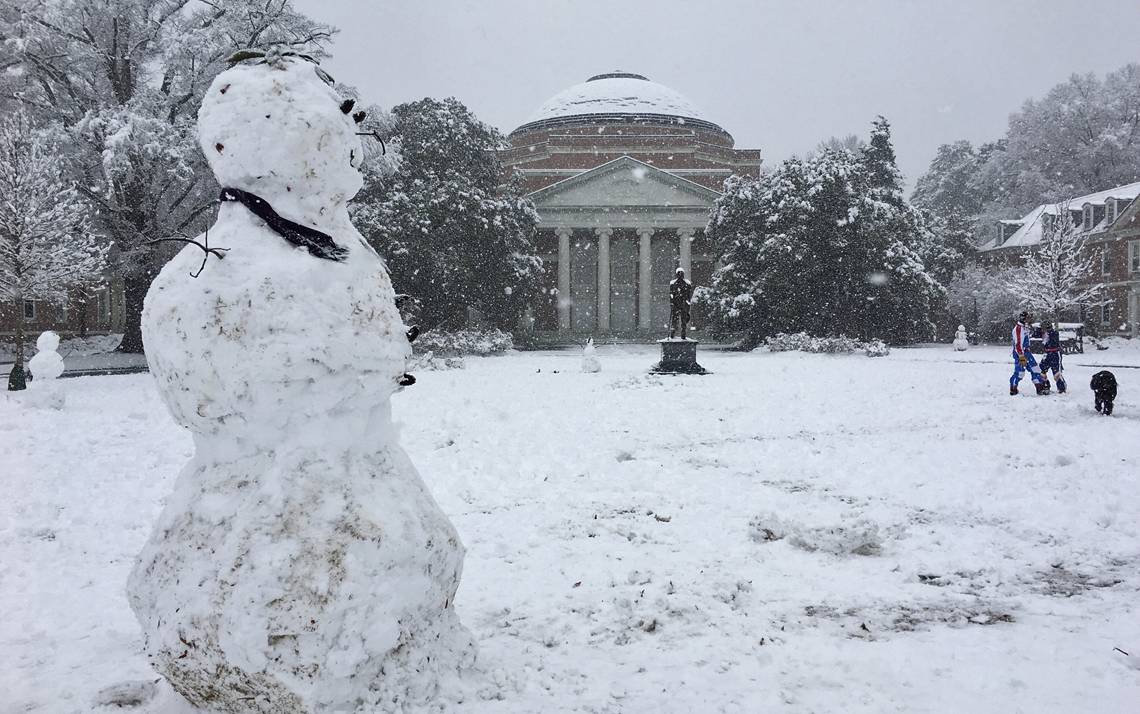 Students play in the snow Wednesday on East Campus. Photo by Jonathan Black.