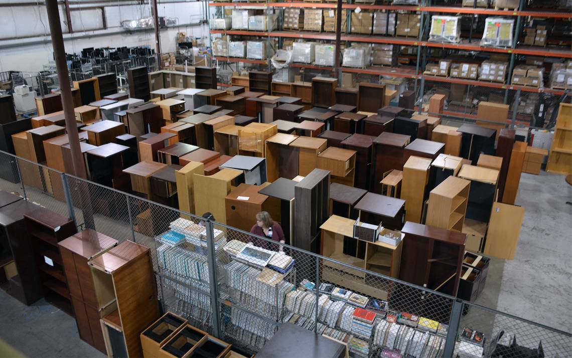 The Duke Surplus warehouse stores bookshelves, desks, chairs and other office supplies. Photo by Jonathan Black.