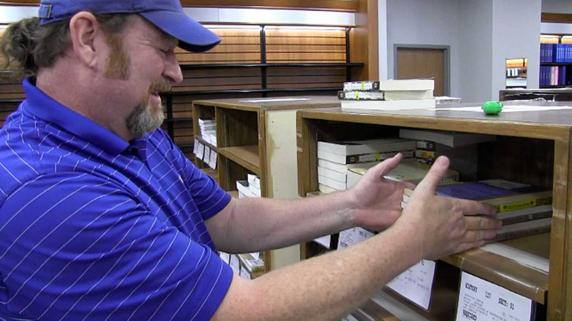 Jeff Perkins, a 28-year employee at Duke, oversees textbook delivery and sorting at the University Store in the Bryan Center, where every year, he spends an entire day watching the delivery of thousands of books for students.