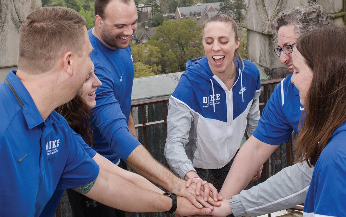 Duke Recreation & Physical Education staff members cheer after climbing 239 steps to the top of Duke University Chapel. Photos by Justin Cook.