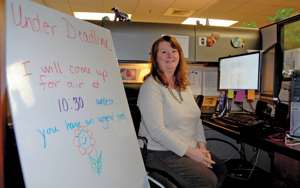In a strategy learned from the “Managing Multiple Priorities” course, Tracey Torain lets co-workers know when she’s doing tasks that need her undivided attention.