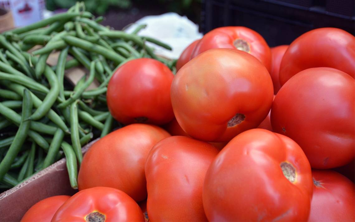 Pick up produce like tomatoes and green beans straight from the farm with Duke's Alternative Mobile Farmers Market. Photo by Jonathan Black.