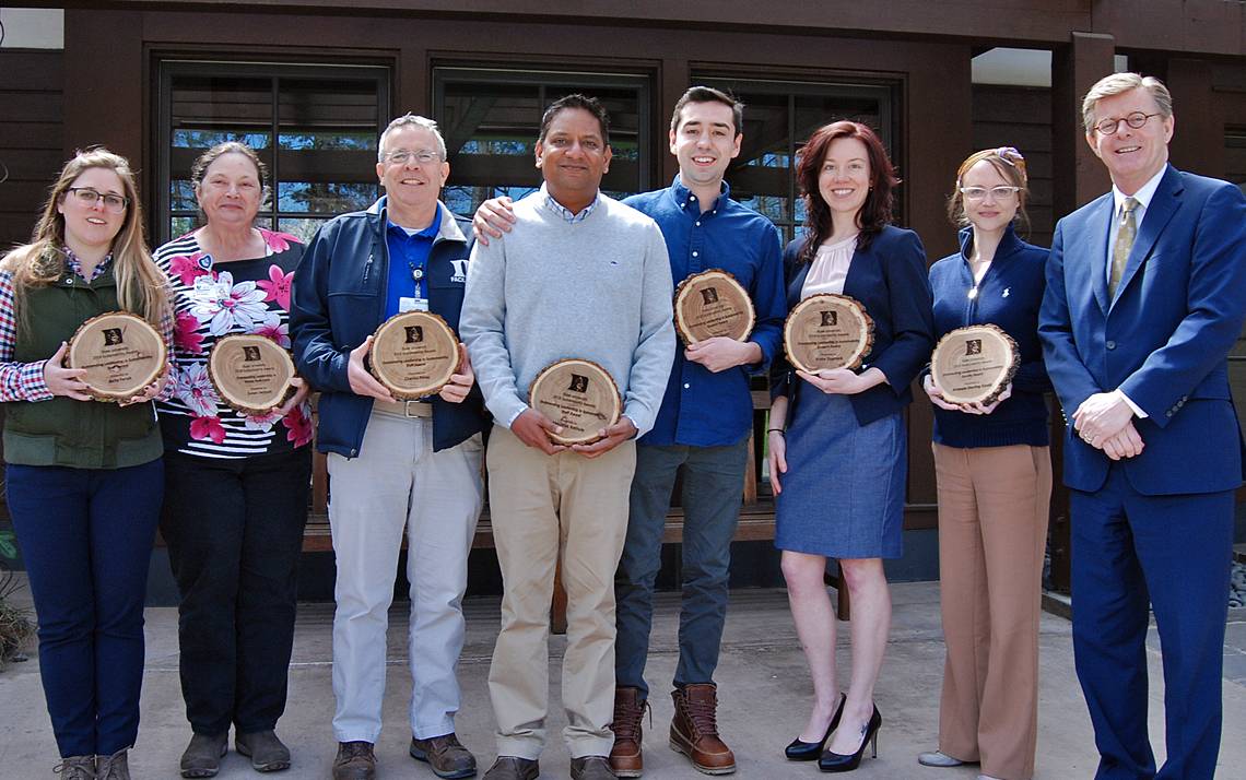 Duke Sustainability Award winners in 2019, from left to right, Belle Farish, Susan Jackson, Charlie Perez, Abhi Bathula, John Desan, Trisha Dupnock, Amanda Starling Gould and Duke University President Vincent E. Price. Photo by Stephen Schramm.