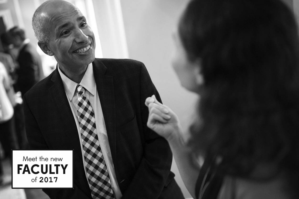 Abbas Benmamoun, meeting with a faculty member at a reception this week, says he appreciates the approach Duke is taking linking diversity to excellence. Photo by Chris Hildreth/Duke Photography