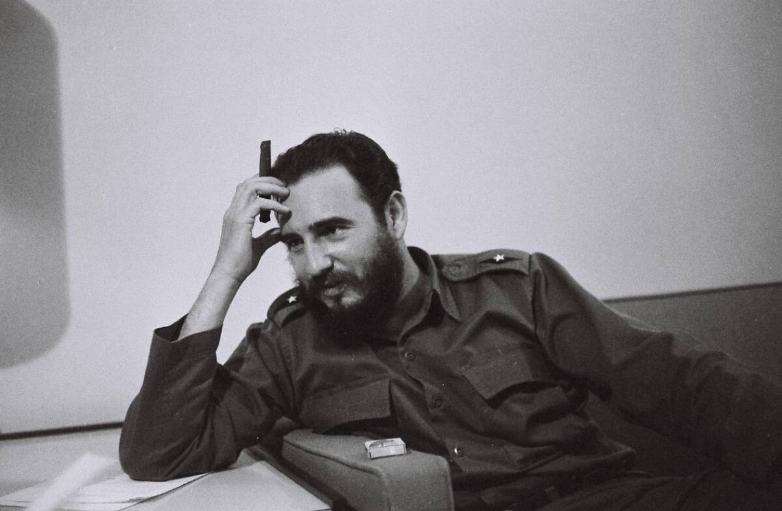 Fidel Castro in the Habana Libre Hotel, answering questions and writing to the ambassador to France, part of the Deena Stryker Collection in the Rubenstein Library