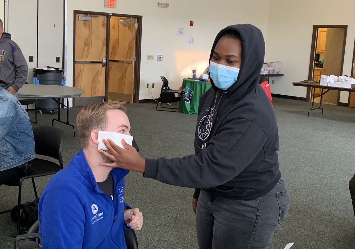 Trevor Anderson and Bernice Meja practice emergency triage during the CERT training