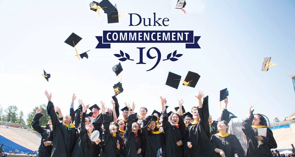 Duke students toss their mortarboards in the air in celebration of commencement