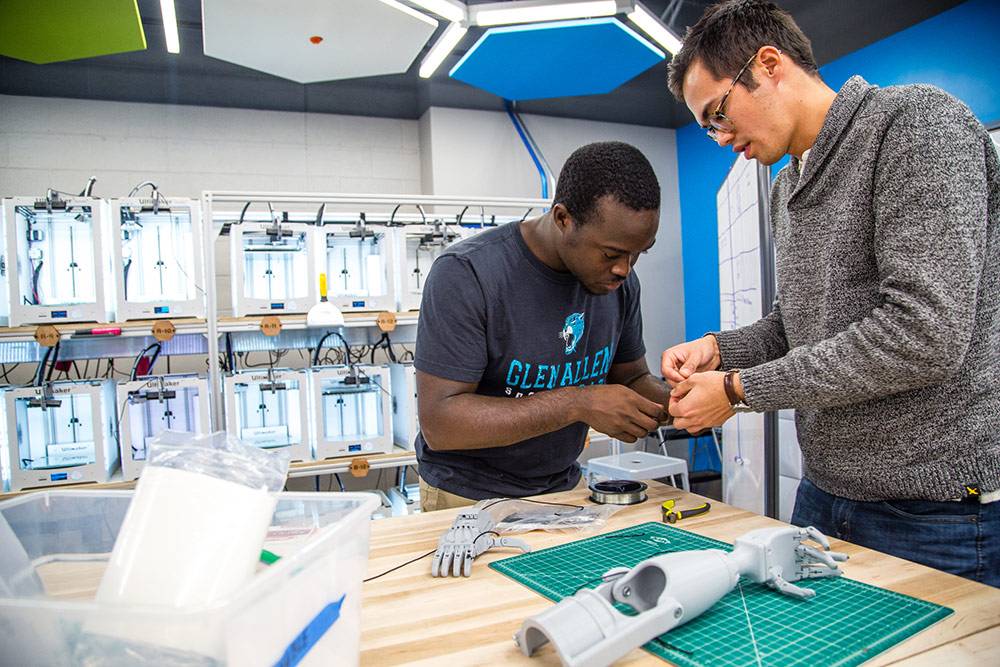 Duke seniors Richard Beckett-Ansa and Henry Warder co-founded the eNABLE chapter, which makes prosthetics using 3D printers. Photo by Pilar Timpane