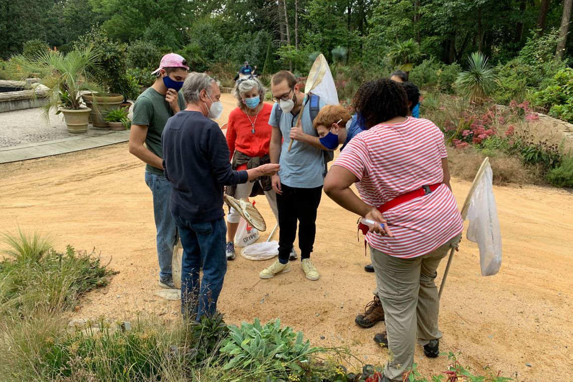 An entomology class checks out one of the many different insect species found in Duke Gardens.