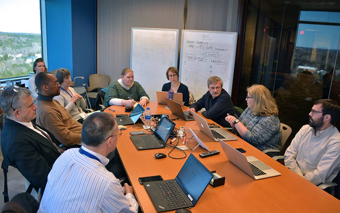 Members of the TechExpo planning committee meet to discuss this year's event. Photo by Jonathan Black.