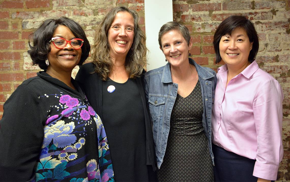 From left, Zoila Airall, Victoria Krebs, Colleen Scott and Li-Chen Chin pose together. The four Duke employees shared their stories of breast cancer at a recent Women’s Center event.