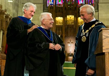 Gerald Wilson is presented the University Medal by Academic Council Chair Josh Socolar while President Richard Brodhead looks on.  Photo by Duke University Photography.