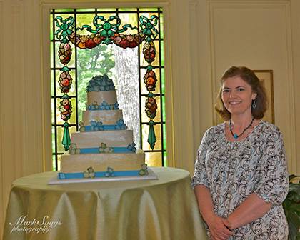 In her spare time, Debrah Suggs decorates cakes such as this wedding cake. Photo courtesy of Suggs photography. 
