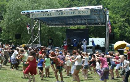 Crowds at last year's Festival for the Eno get up and dance during one of dozens of musical performances. Duke faculty and staff can buy discounted tickets to this year's event. Photo courtesy of the Eno River Association.