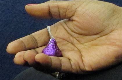 Participants in a DukeWell seminar practiced eating a chocolate candy mindfully. Photo by Marsha A. Green.