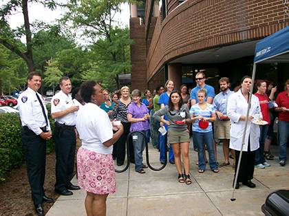 Duke community members gather as part of last year's National Night Out event with Duke Police. This year's family-friendly program will feature a variety of information tables, a chance to speak with officers and free refreshments. Photo courtesy of Duk