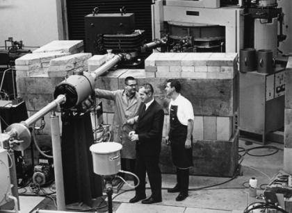 This undated photo shows (L-R) Russell Roberson, Ed Bilpuch, director of TUNL, and Al Lovette in the underground accelerator.