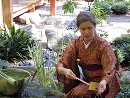 Nancy Hamilton follows centuries-old traditions from Japan during a tea gathering at the Sarah P. Duke Gardens' teahouse. Photo by Jeanette Stokes.