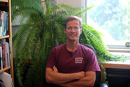Joel Meyer with the fern in his office which has been propagated from a plant that has been in the family at least from the time of his grandmother, and perhaps longer. Photo courtesy of Joel Meyer.