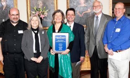 The Arts & Sciences Course Renumbering Team, led by Dr. Ingeborg Walther (holding plaque) received a Blue Ribbon Teamwork Award for its two-year project to standardize numbers for over 8,000 courses. Photo by Duke University Photography.