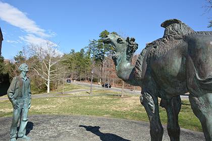 Nature, left, stands with a statue of former Duke scientist Knut Schmidt-Nielsen, who studied the physiology of the camel’s nose, received the International Prize for Biology, and wrote the authoritative text on animal physiology. Nature can be found o