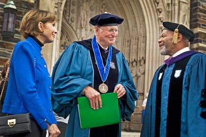 A scene from the 2011 Founders' Day: Karl von der Heyden, who also received the University Medal and gave the Founders' Day address, and his wife Mary Ellen talks with Divinity Professor William Turner following the ceremony. Photo: Duke University Photo
