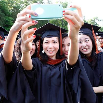 Over the last five years, Duke has helped keep 336,904 bottles out of landfills by providing graduates with gowns made of recycled plastic bottles. Photo by Duke Photography.