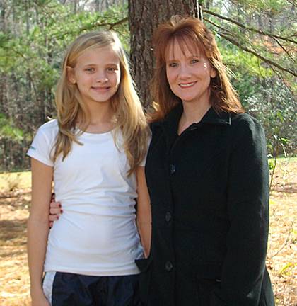 Pam Hanson with her daughter, Amanda, 12, at home in Wilton.